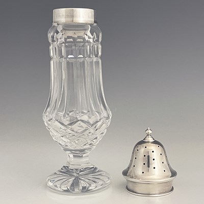Lot 106 - A twentieth-century glass and silver topped...