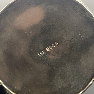 Lot 155 - An Elizabeth II silver circular box, the...