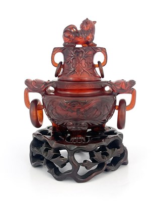 Lot 485 - A Chinese pressed cherry amber censer, ring...