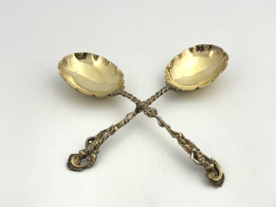 Lot 247 - A pair of Edwardian silver gilt fruit serving...