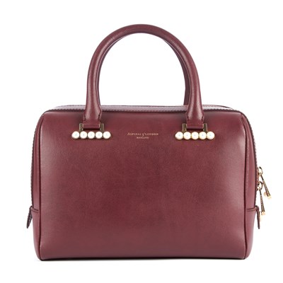 Lot 10 - Aspinal of London, a burgundy Pearl Boston bag,...