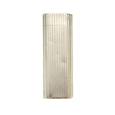 Lot 30 - Cartier, a silver plated lighter, featuring a...