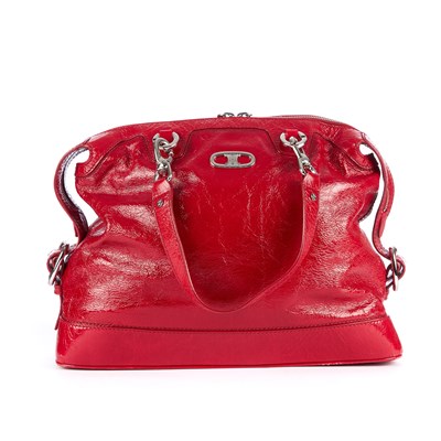 Lot 37 - Celine, a red patent leather handbag,...