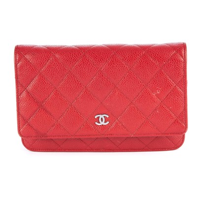 Lot 60 - Chanel, a red Wallet On Chain handbag, crafted...