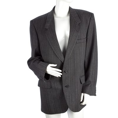 Lot 77 - Christian Dior, a wool blazer, featuring three...