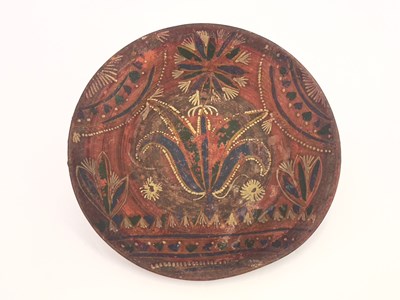 Lot 768 - A Middle Easterm terracotta painted plate