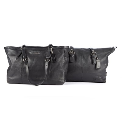 Lot 90 - Coach, two black leather handbags, to include...
