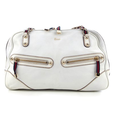 Lot 119 - Gucci, a white leather Capri Chain Zip...