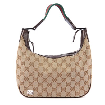 Lot 129 - Gucci, a small hobo handbag, featuring maker's...