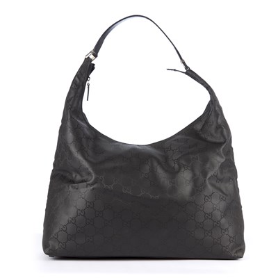 Lot 130 - Gucci, a large black hobo handbag, designed...