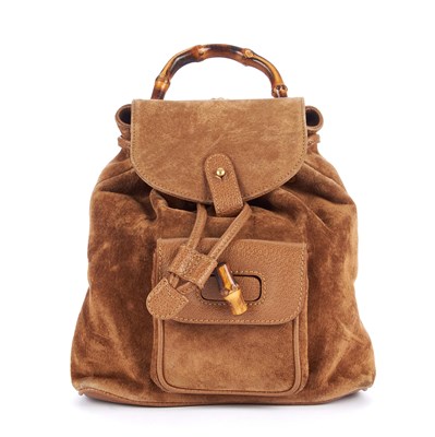 Lot 134 - Gucci, a small brown suede Bamboo backpack,...