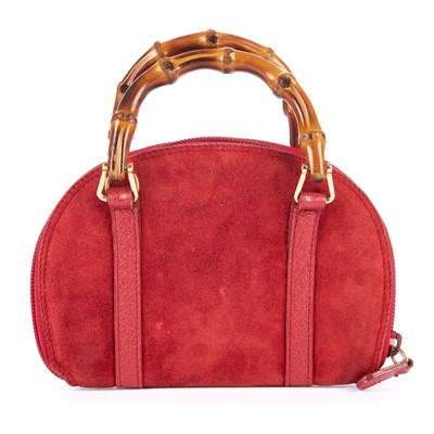Lot 135 - Gucci, a small Bamboo top handle pouch,...