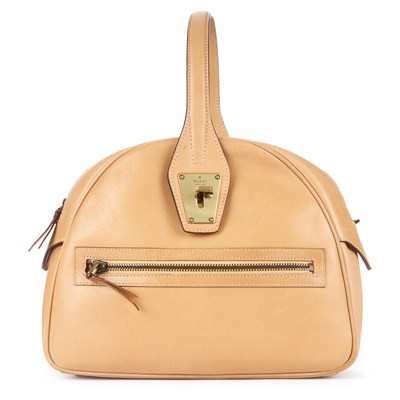 Lot 136 - Gucci, a smooth beige leather handbag,...