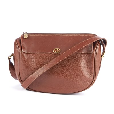 Lot 147 - Gucci, a vintage brown leather handbag,...