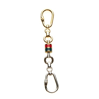 Lot 156 - Gucci, a vintage bicolour double sided keyring,...