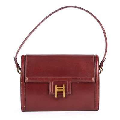 Lot 165 - Hermes, a vintage burgundy Sac Rondo handbag,...