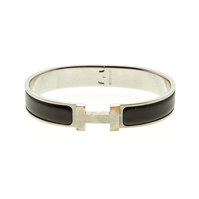 Lot 169 - Hermes, a Clic H bracelet, the hinged black...