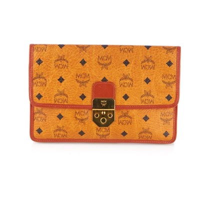 Lot 264 - MCM, a wristlet clutch, designed from maker's...