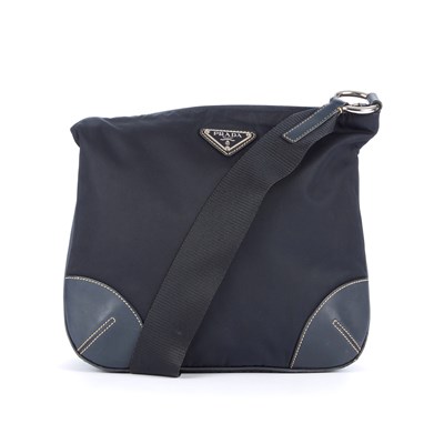 Lot 307 - Prada, a small navy blue nylon crossbody...