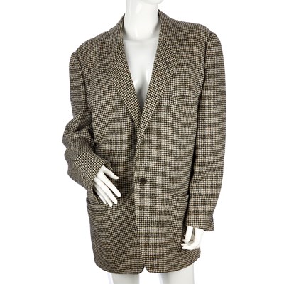 Lot 343 - Gianni Versace, a dogtooth wool blazer,...