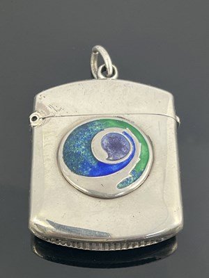 Lot 109 - Archibald Knox for Liberty and Co., an Arts and Crafts silver and enamelled vesta case