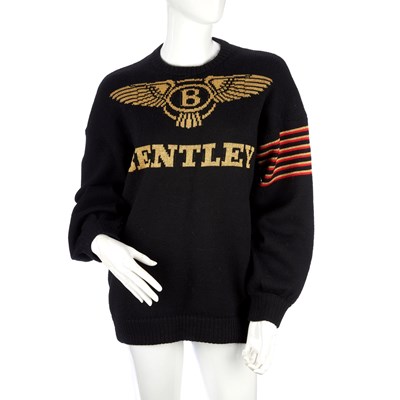 Lot 366 - A vintage jumper, black hand knitted wool,...