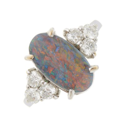 Lot 400 - An 18ct gold black opal cabochon dress ring,...