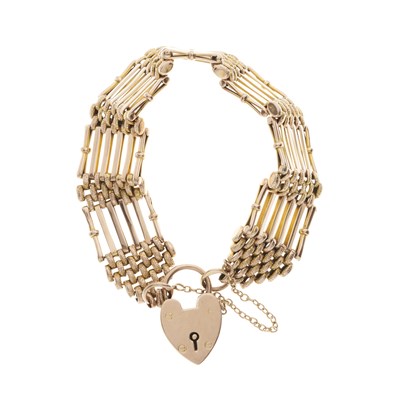 Lot 413 - An early 20th century 9ct gold textured and...