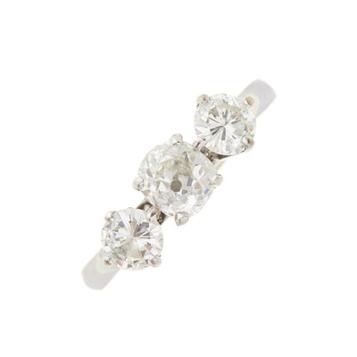 Lot 424 - A platinum old and brilliant-cut diamond three-...