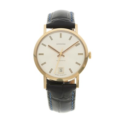 Lot 437 - Garrard, a 9ct gold date wrist watch,...