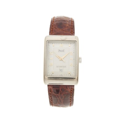Lot 447 - Piaget, an 18ct gold automatic date wrist...