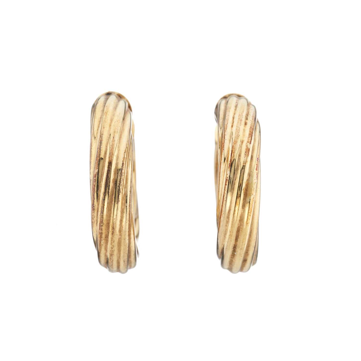 Lot 50 - A pair of 9ct gold twist hoop earrings
