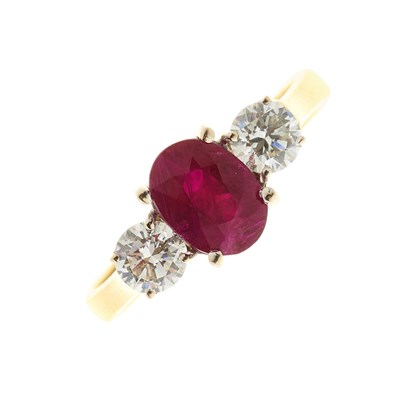 Lot 69 - An 18ct gold ruby and diamond three-stone ring