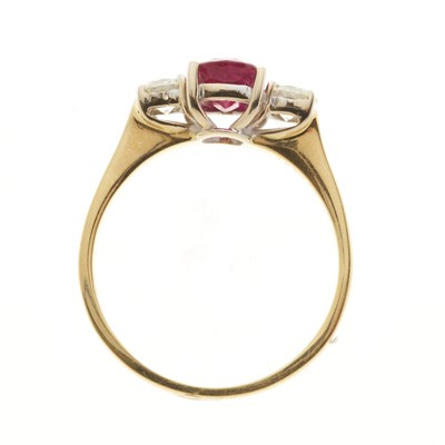 Lot 69 - An 18ct gold ruby and diamond three-stone ring
