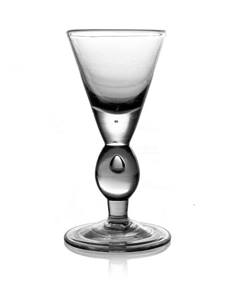 Lot 515 - A Queen Anne heavy baluster wine glass, circa...