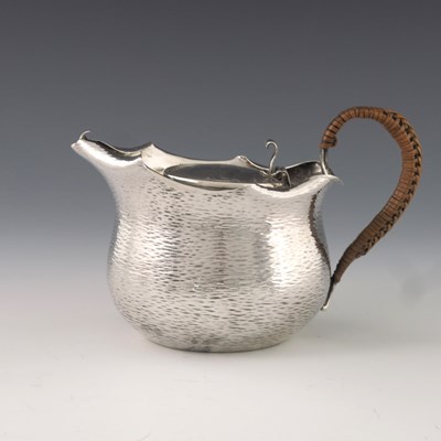 Lot 153 - A Victorian Aesthetic Movement silver tea set,...