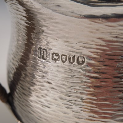 Lot 153 - A Victorian Aesthetic Movement silver tea set,...