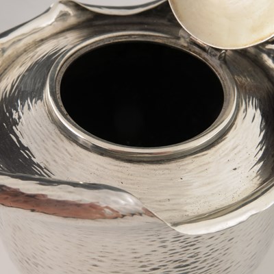 Lot 153 - A Victorian Aesthetic Movement silver tea set,...