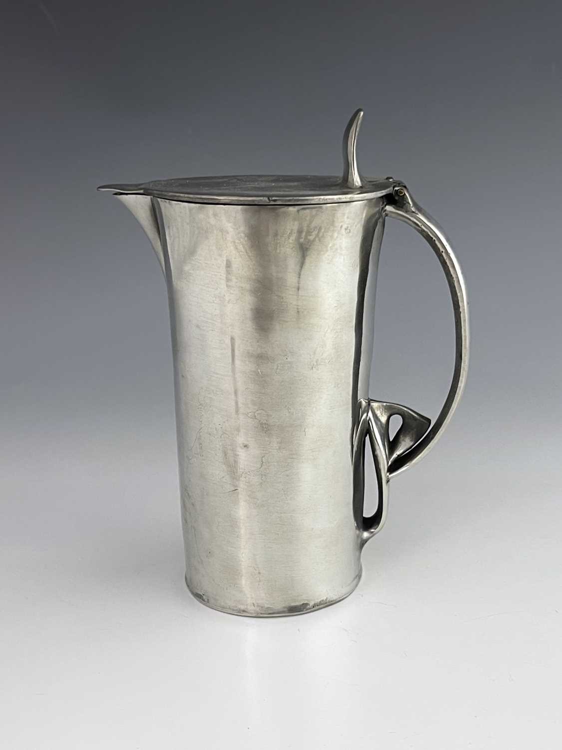 Lot 132 - Archibald Knox for Liberty and Co., a Tudric Arts and Crafts pewter lidded jug