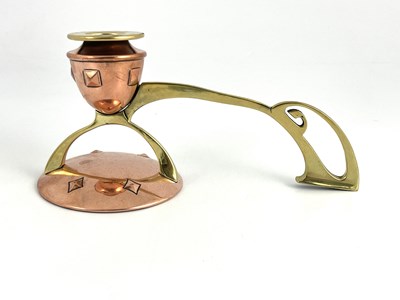 Lot 740 - A Jugendstil copper and brass chamber stick,...