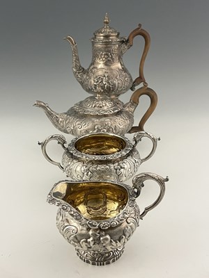 Lot 46 - A George III/IV silver matched four-piece tea...