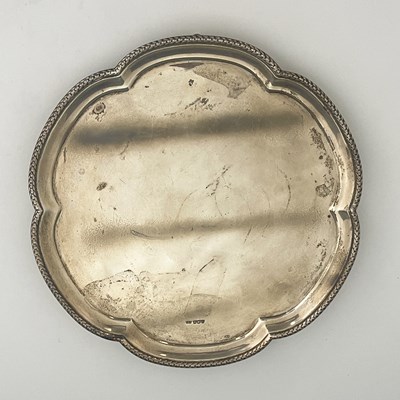 Lot 50 - A George V silver salver, of hexafoil form,...