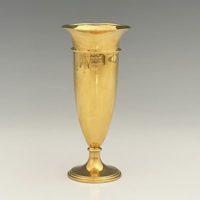Lot 222 - An Edwardian silver gilt vase, of tapered...