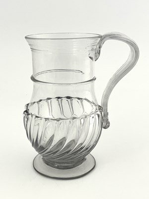 Lot 458 - A George III glass tankard, circa 1770, footed...