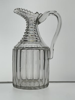 Lot 459 - A cut glass claret jug, circa 1820, cylinder...