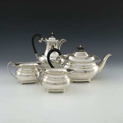 Lot 54 - A George VI silver four piece tea set,...