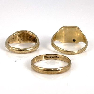 Lot 18 - Three 9 carat gold rings, including wedding...