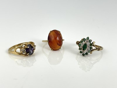 Lot 19 - Three gold and gem set rings, including emeral...