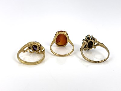 Lot 19 - Three gold and gem set rings, including emeral...