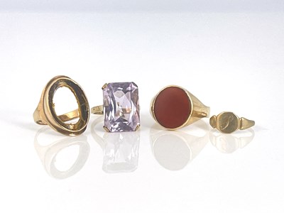 Lot 28 - Four gold rings, including carnelian signet...